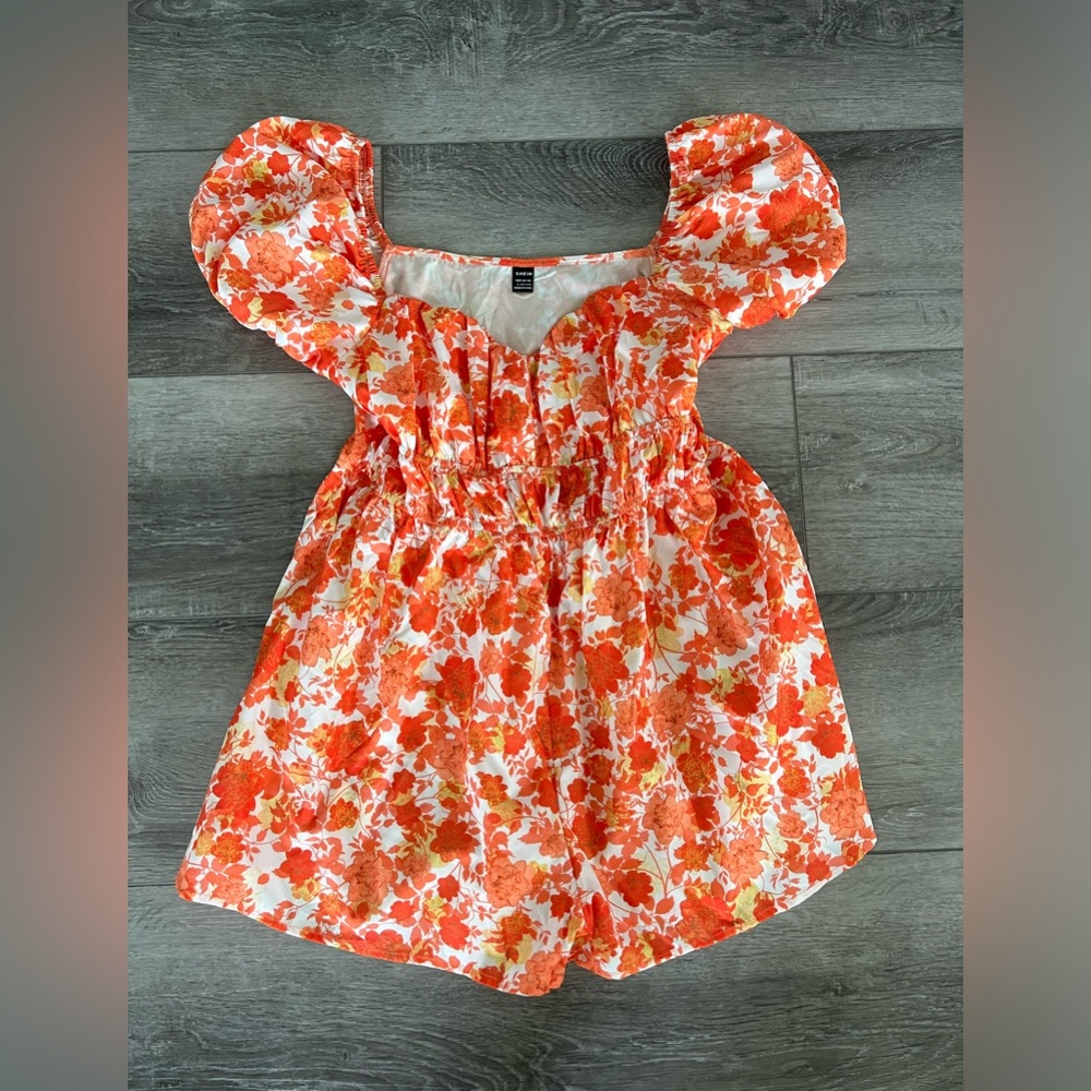 Orange romper. So perfect for summer! Size L new no tags